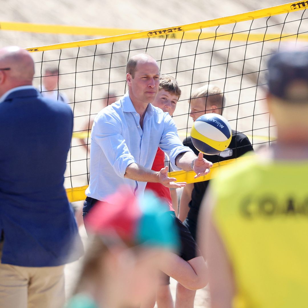 Prince William plays beach volleyball as he begins overnight trip to Cornwall 