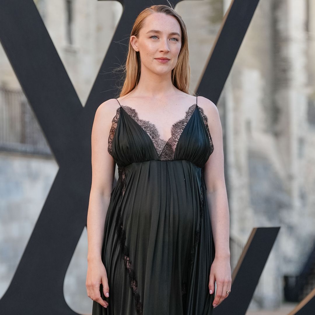 Saoirse Ronan’s pregnancy glow is unmissable in lace-trimmed silk gown