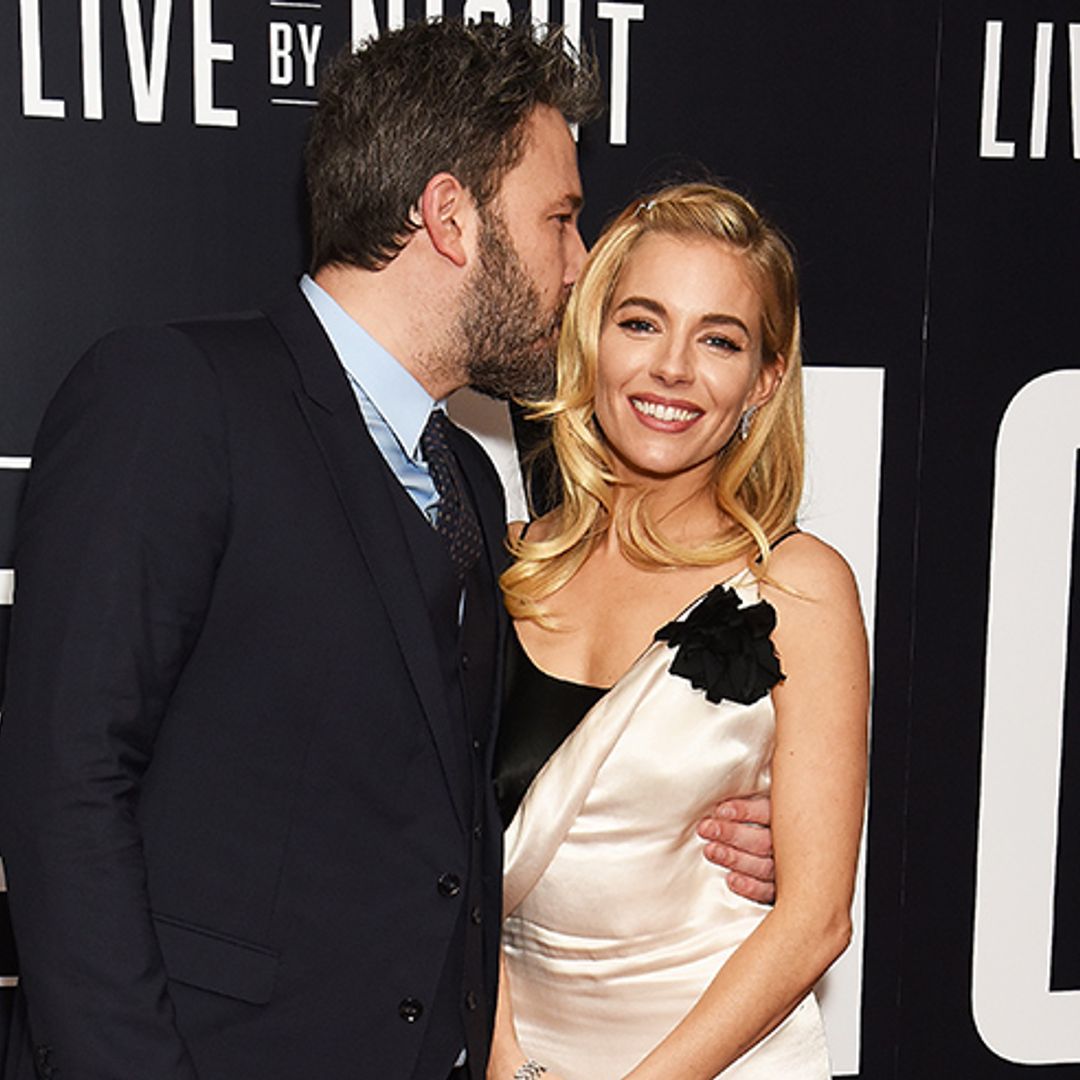 Live by Night's Sienna Miller and Ben Affleck snuggle close on the red carpet