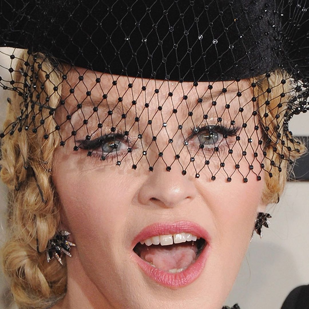Madonna blows fans away in stunning purple ensemble