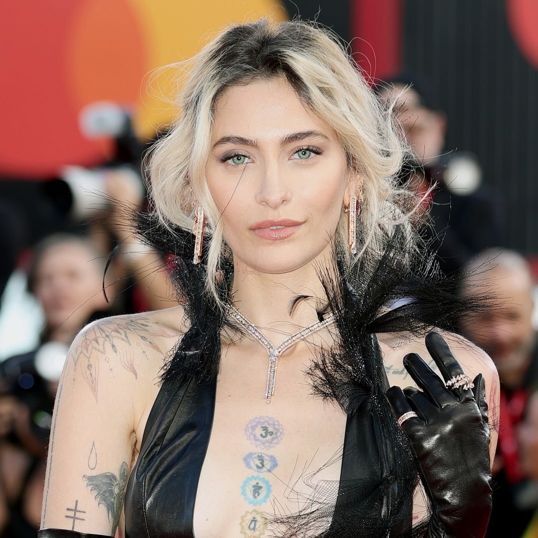 Paris jackson in black leather dress and gloves 