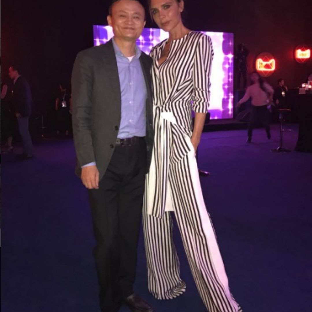 Victoria Beckham is stylish in stripes at fashion gala