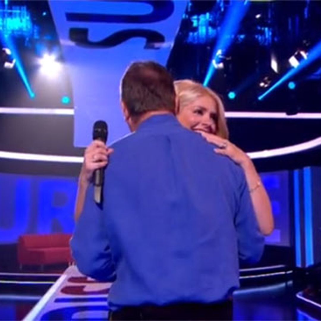 Surprise Surprise host Holly Willoughby breaks down in tears when her dad surprises her at work