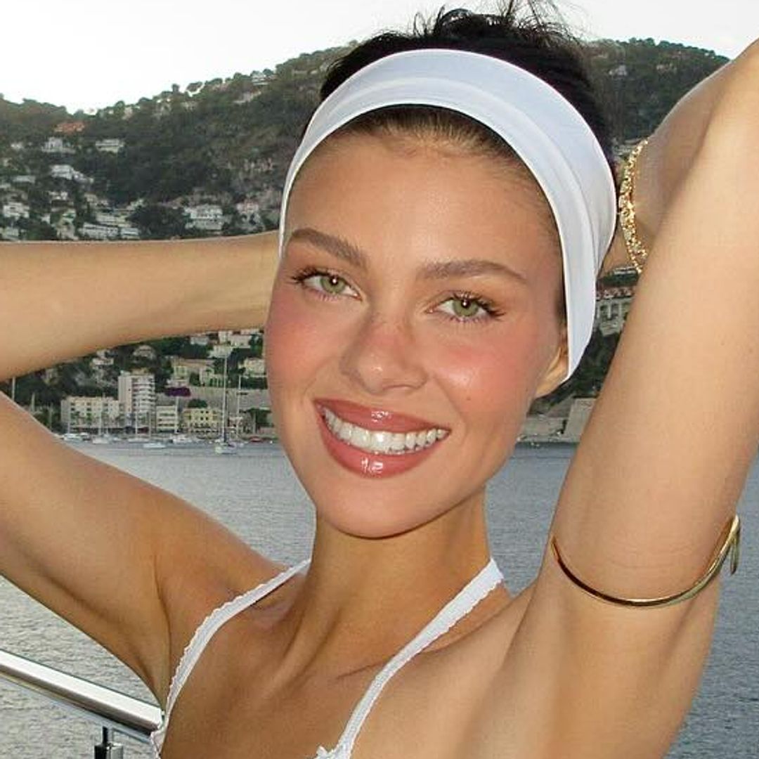 Nicola Peltz poses in striking strapless bikini following teeth transformation