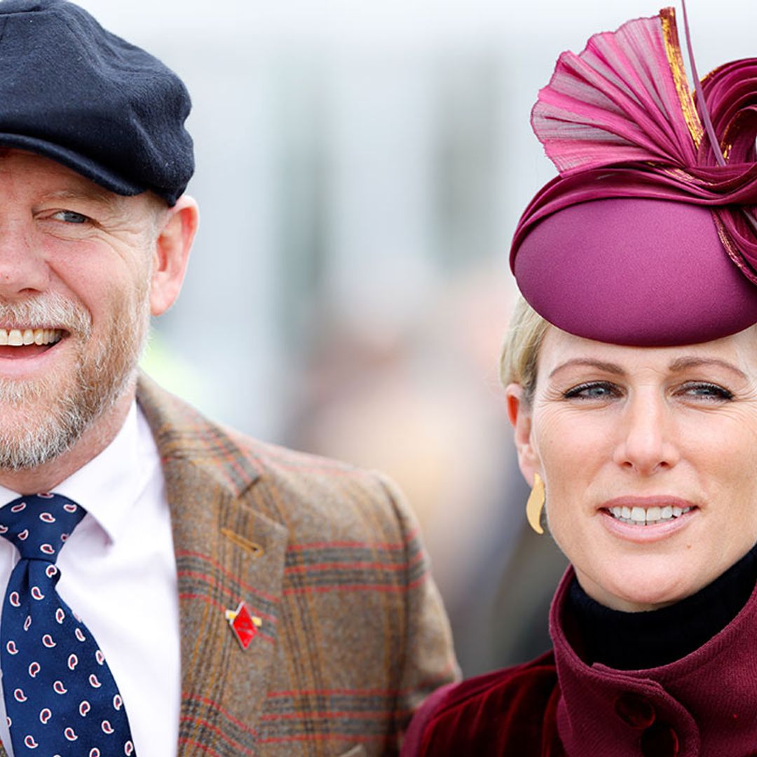 Zara Tindall cuddles her daughter Lena during a family day out in Norfolk - see photos