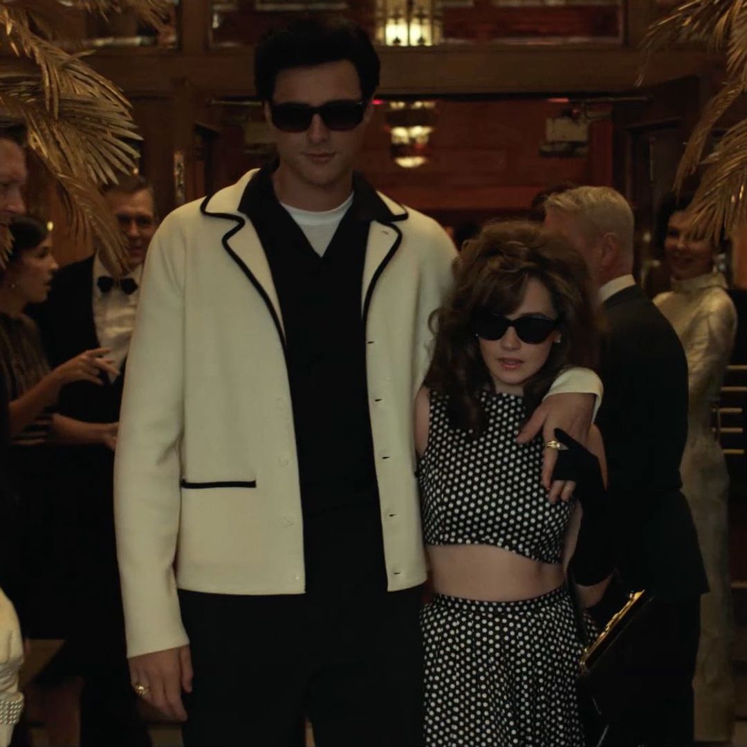 jacob elordi in elvis in a white jacket and sunglasses