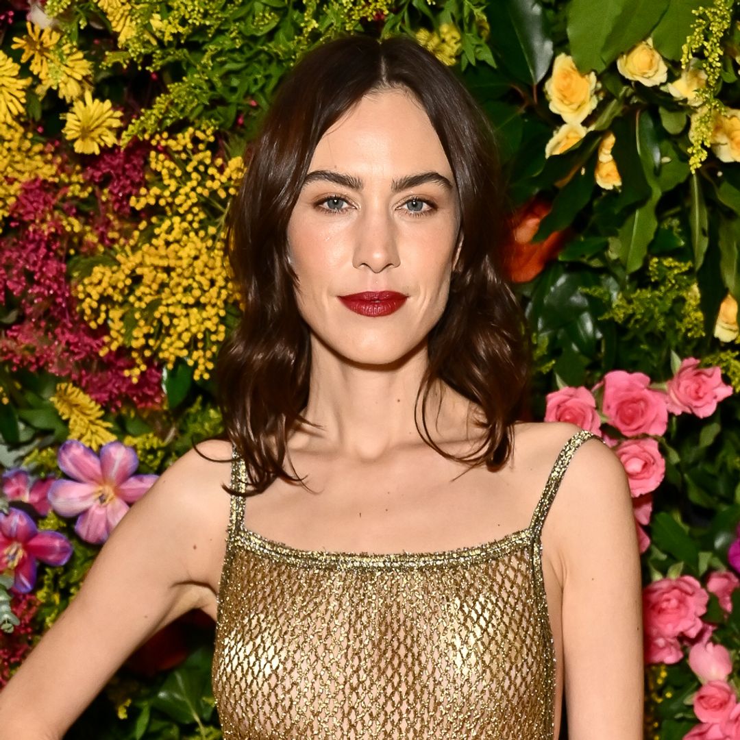 Alexa Chung's stunning sheer tights and silk shorts combo is the ultimate spring evening look