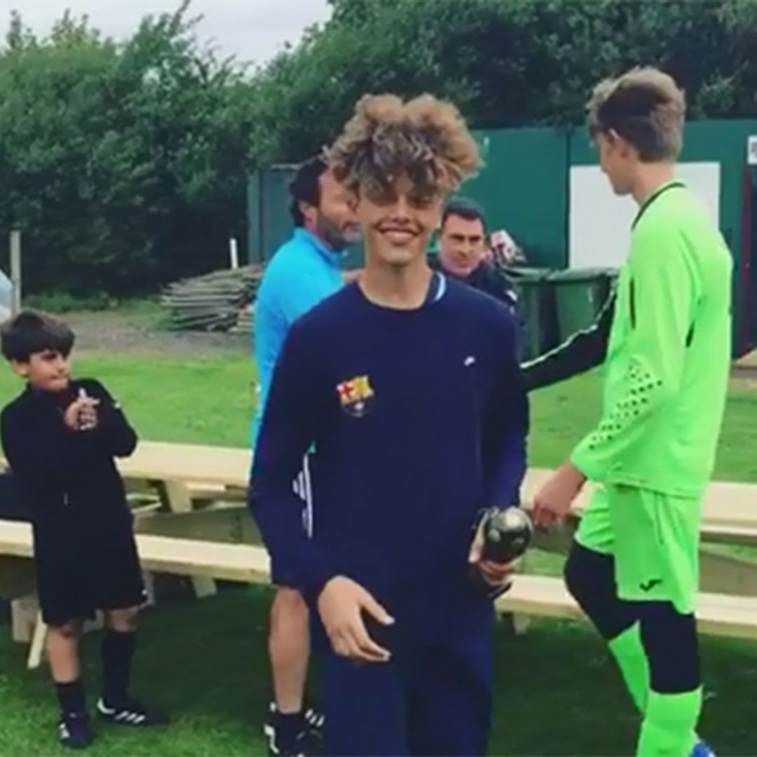 Proud dad Jeff Brazier shares video of son Bobby winning football trophy