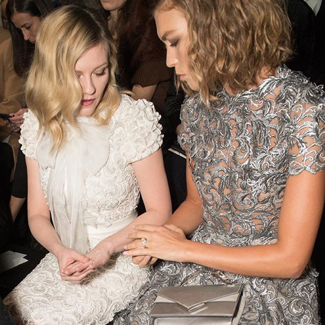 Kirsten Dunst and Arizona Muse compare engagement rings on the front row