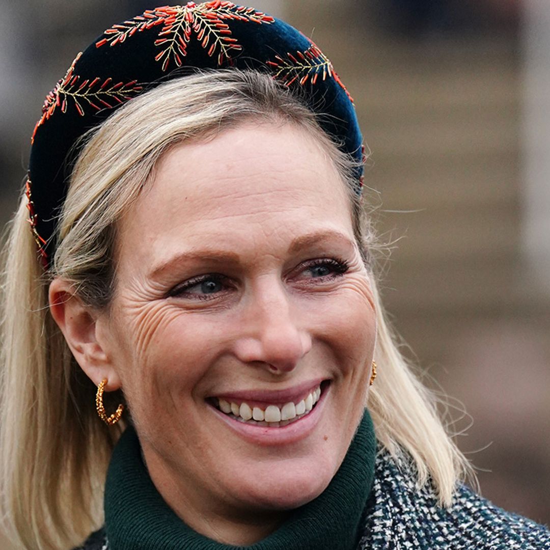Zara Tindall looks sensational in flattering checked coat and knee-high boots for a day at the races