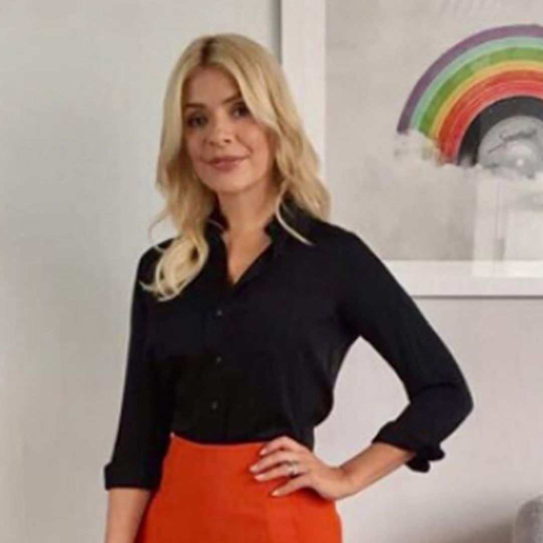 Holly Willoughby shows off tiny waist in bold orange trousers