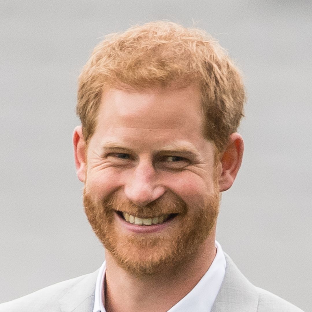 Prince Archie has dad Prince Harry's identical cheeky smile in rare photo