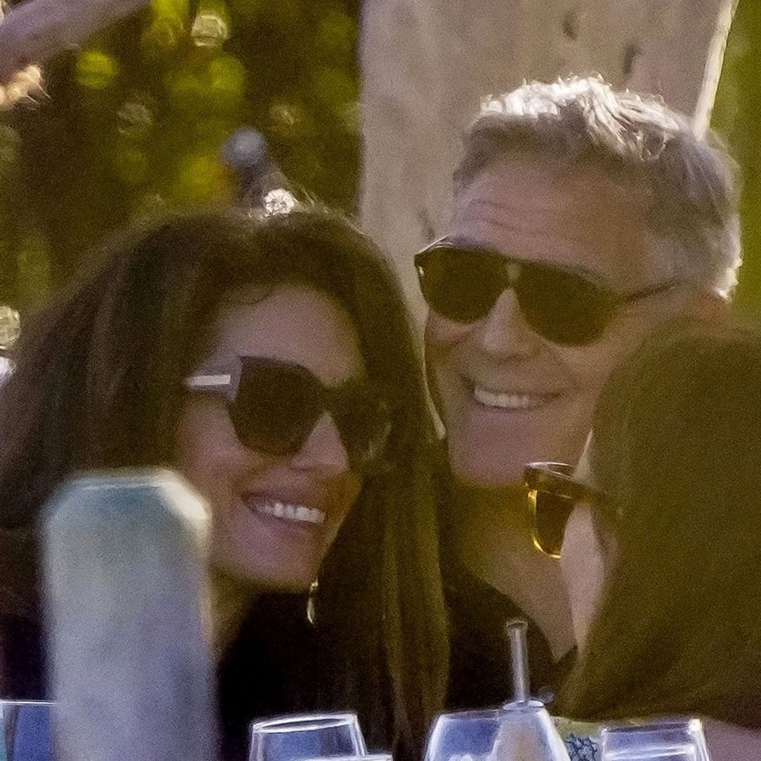 George Clooney can't keep hands off Amal on luxury beach date