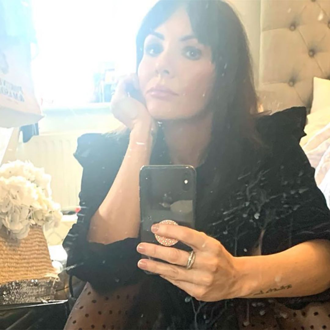 Martine McCutcheon poses on Instagram in £46 LBD and sheer spotty tights