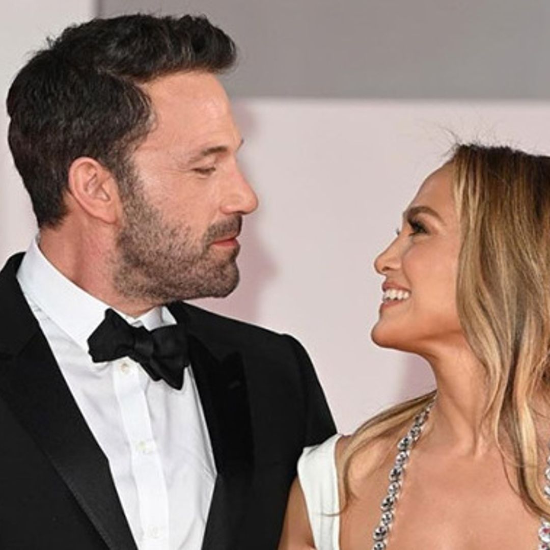 Jennifer Lopez and Ben Affleck share a kiss at the 2021 Met Gala