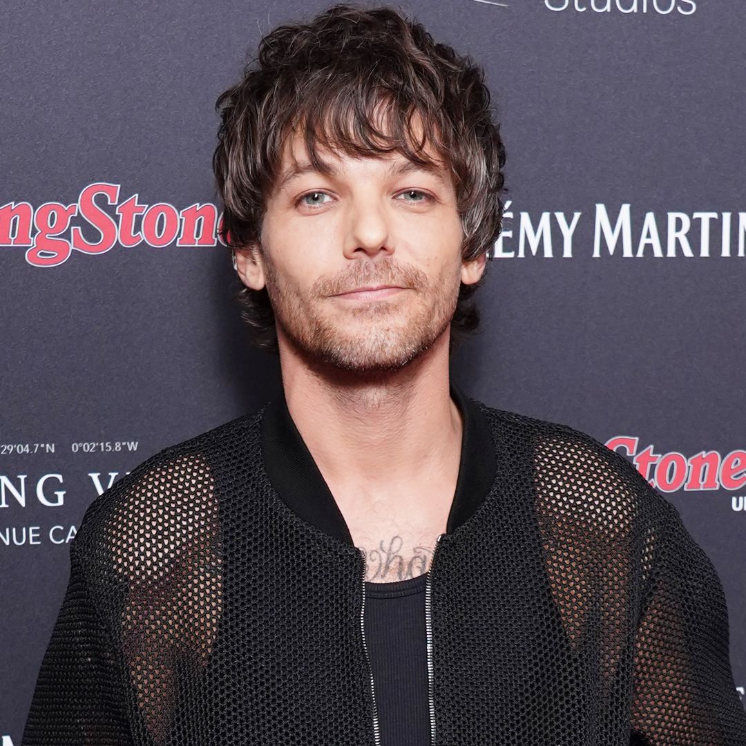 Louis Tomlinson's lookalike son makes rare appearance