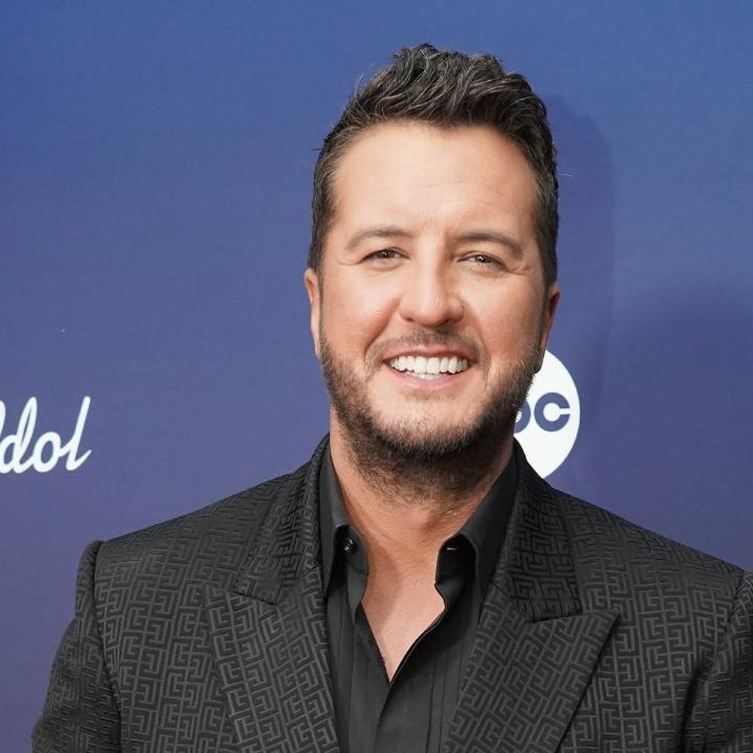 Luke Bryan surprises fans as he performs carrying a baby on stage