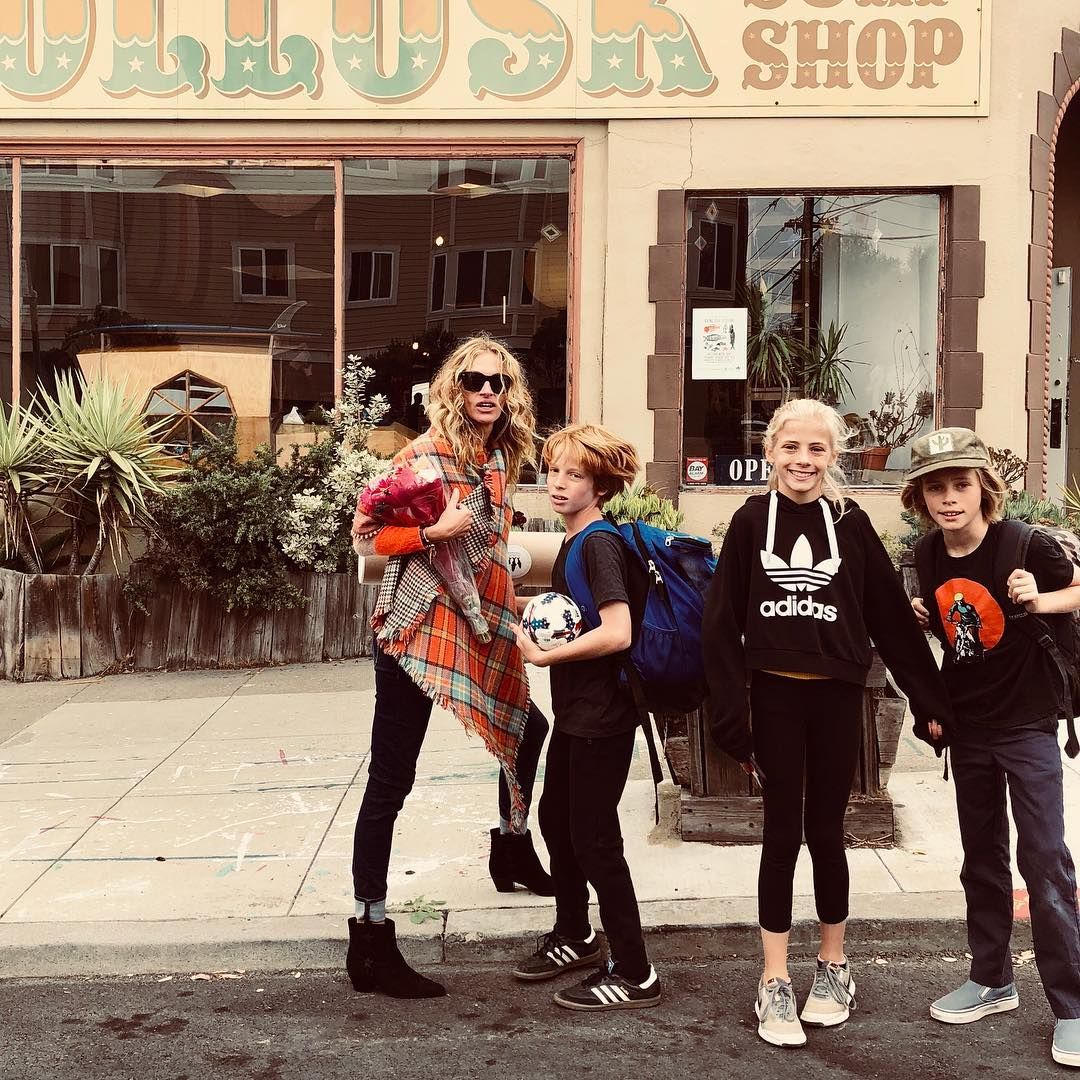Julia Roberts captured outside a surf shop with her three kids, Phinnaeus, Hazel and Henry Moder, shared on Instagram