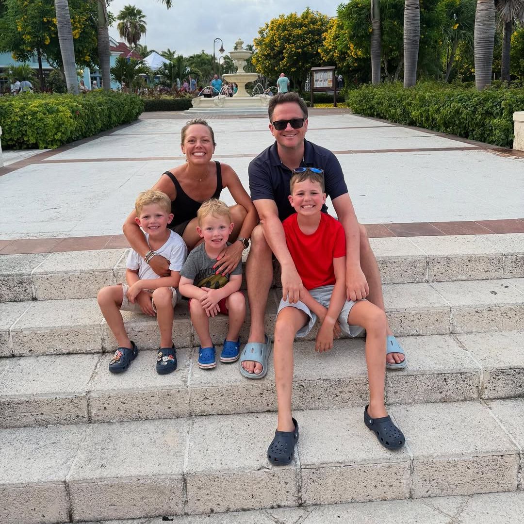 Dylan Dreyer and Brian Fichera pose for a photo on steps with their three sons, shared on Instagram