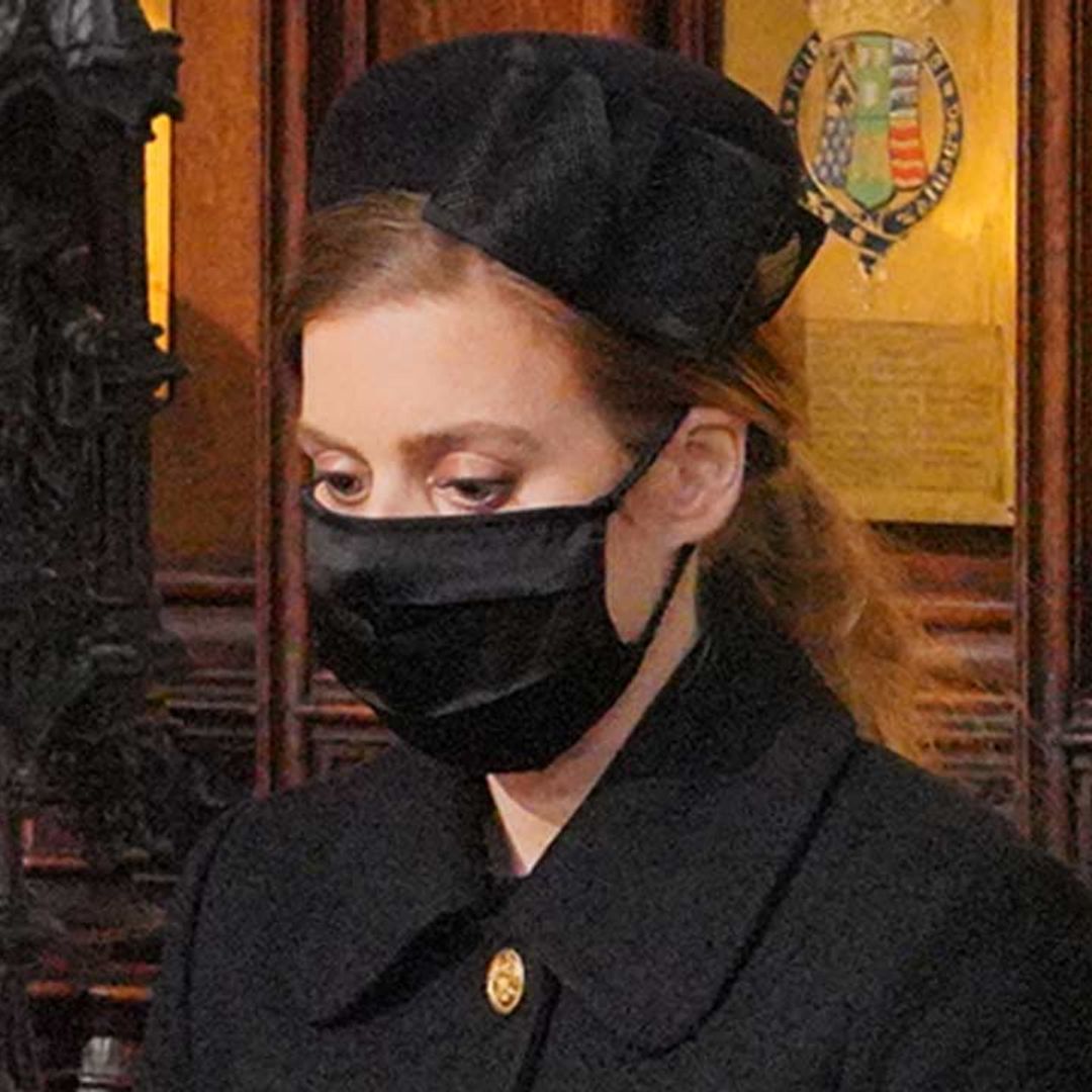 Princess Beatrice looks sombre in black as she pays her respects to the Duke of Edinburgh