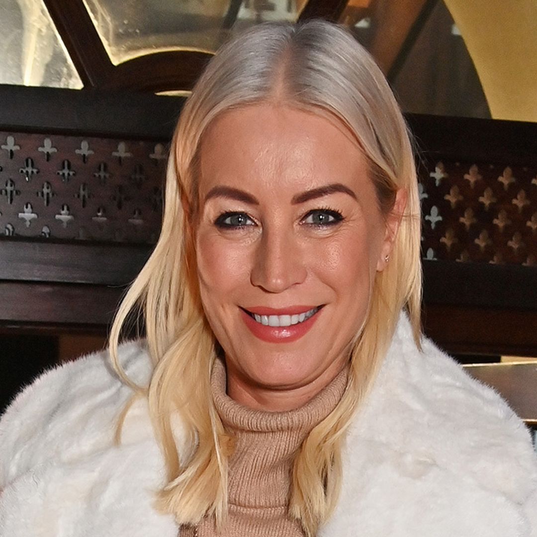 Denise van Outen turns up the heat in bold swimsuit during romantic getaway