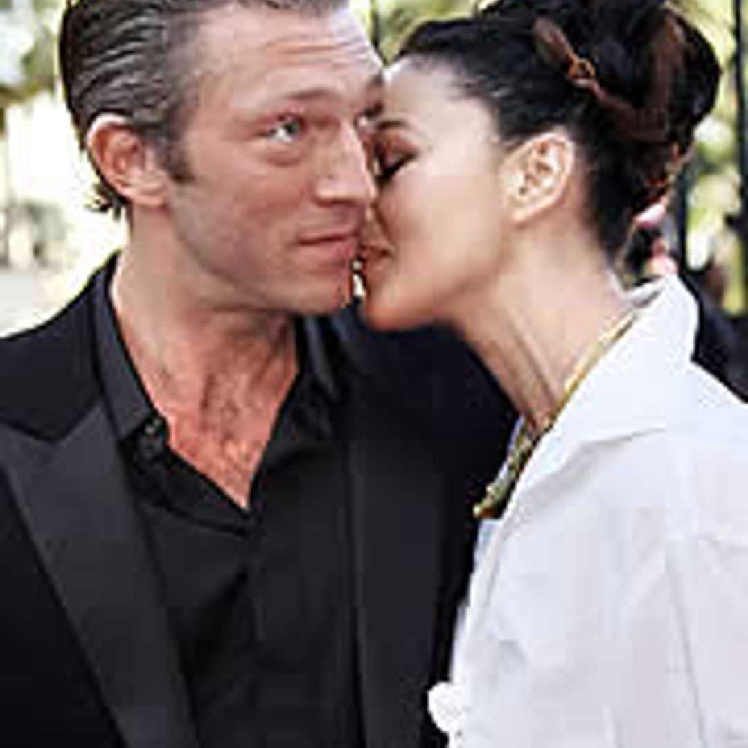 Hot-lipped stars shower kisses on Cannes