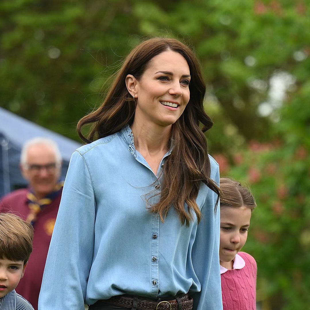 Princess Kate gets her hands dirty in denim shirt and fitted trousers at The Big Help Out
