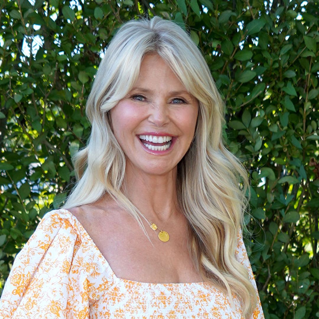 Christie Brinkley, 68, poses in a rainbow dress with daughters in wonderland garden