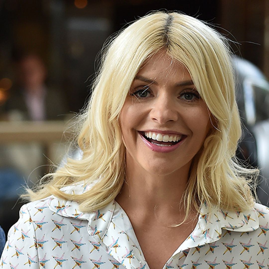 Holly Willoughby shows off her toned and tanned legs in stylish kaftan