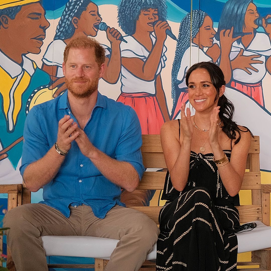 Prince Harry and Meghan Markle in Colombia day three: Pair learn to play drums with a 'big smile'