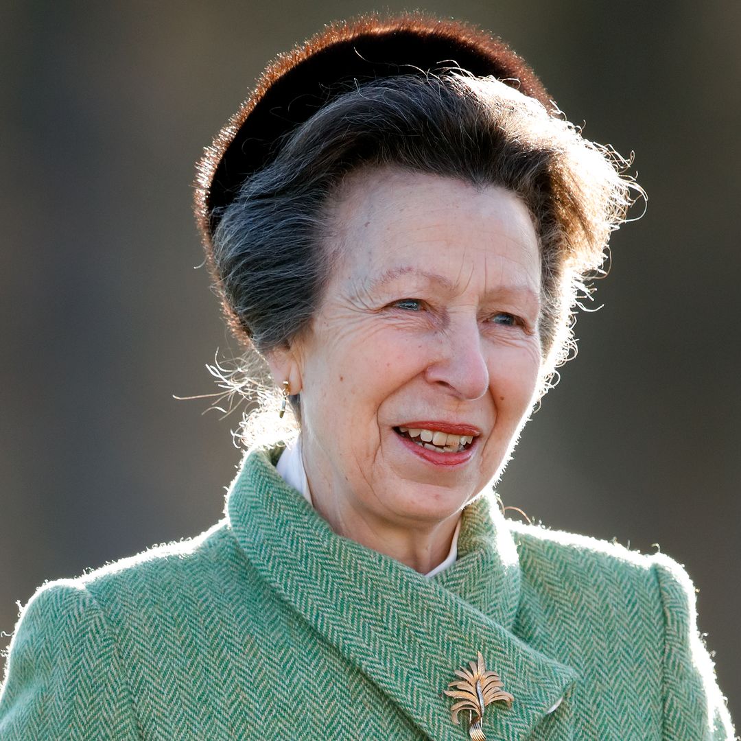 Princess Anne looks sharp in fitted tweed and leather