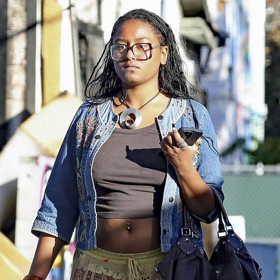 Sasha Obama puts statuesque physique on display in midriff-baring outfit - and you should see her nails