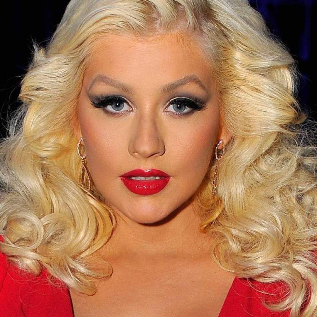 Christina Aguilera resembles a goddess in daring flame-hot bodice