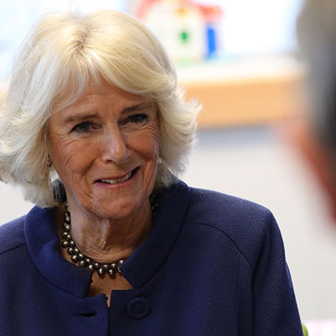 The Duchess of Cornwall stuns in the ultimate dress coat - and wait 'til you see the sleeves