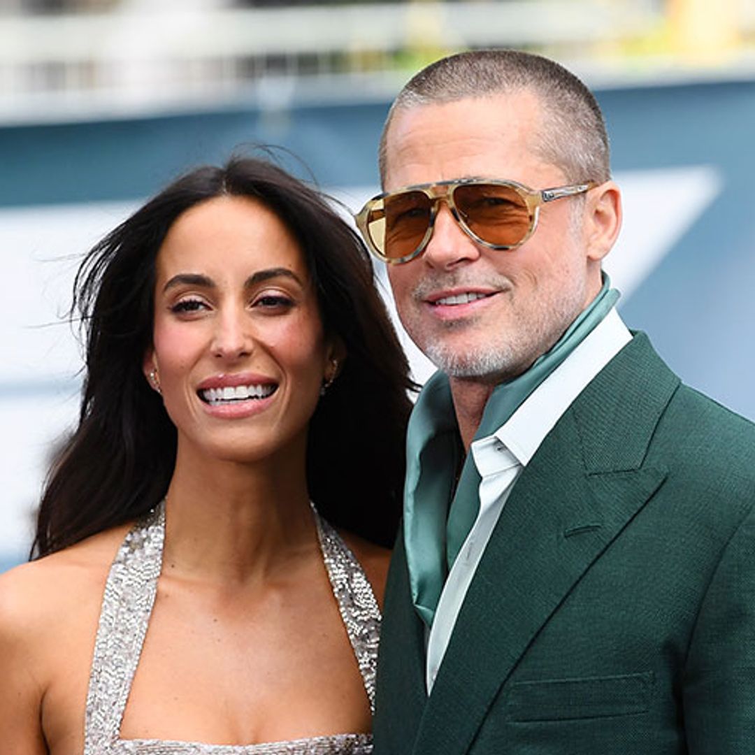 Brad Pitt looks loved-up with girlfriend Ines de Ramon as they join Tom Cruise at premiere