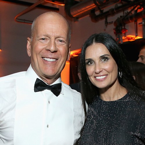 Bruce Willis and Demi Moore's three lookalike daughters pose in matching robes in stunning photos from Vegas sister vacation