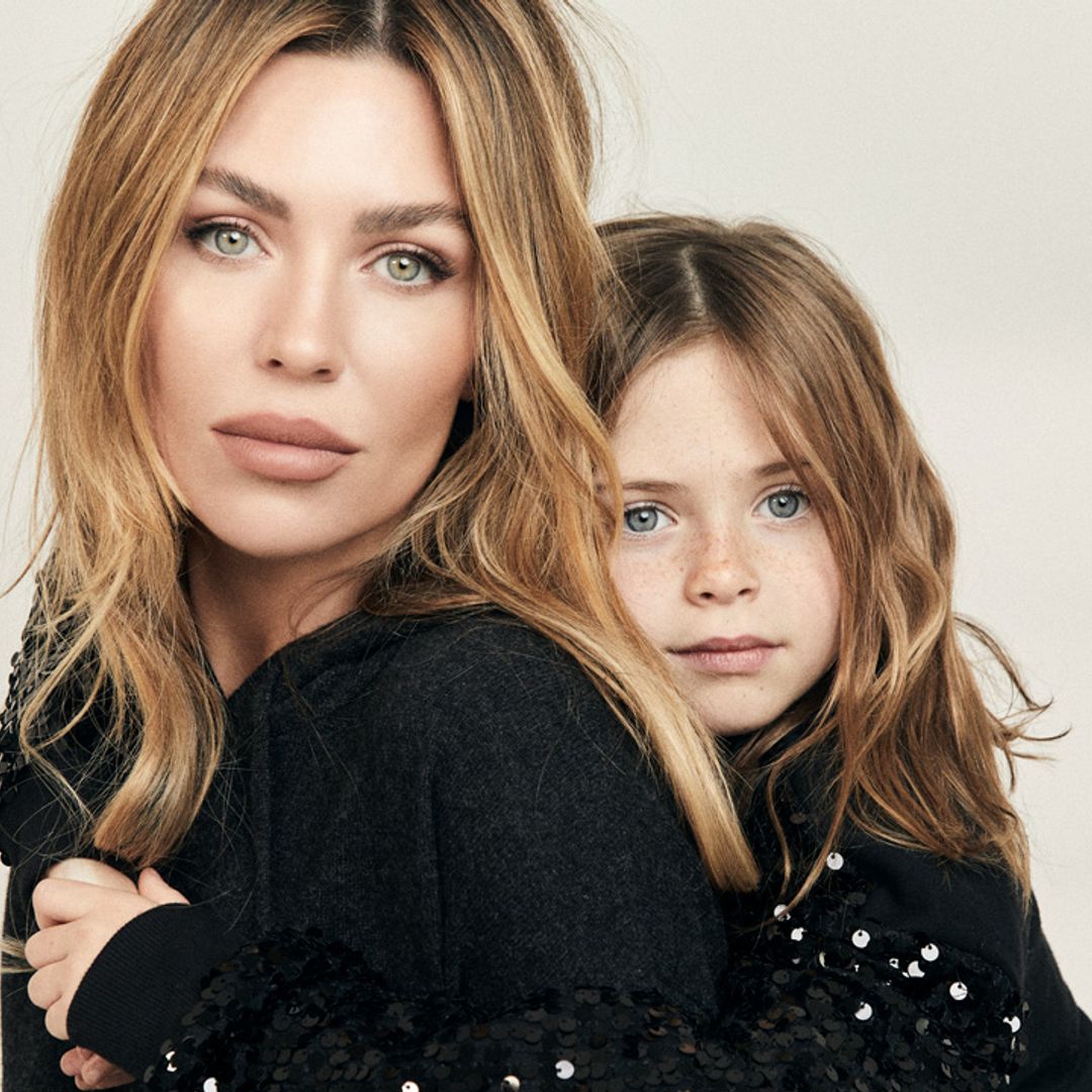 Abbey Clancy rocks F&F Tesco leather trousers as she's pictured with lookalike daughter