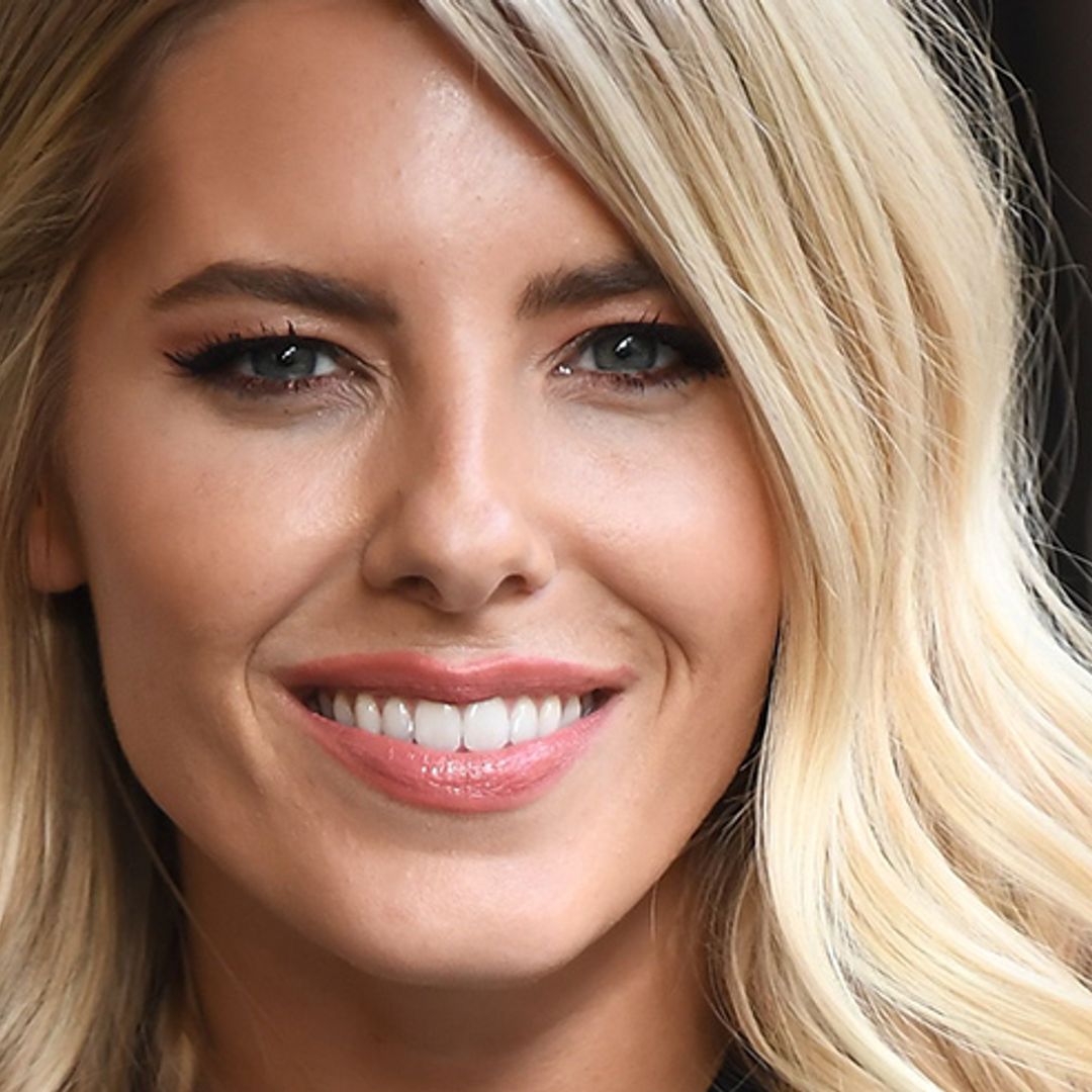 Mollie King shows off her toned dancers' legs in PVC skirt