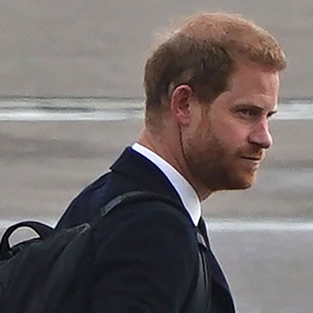 Prince Harry pictured consoling airport staff after Queen's death
