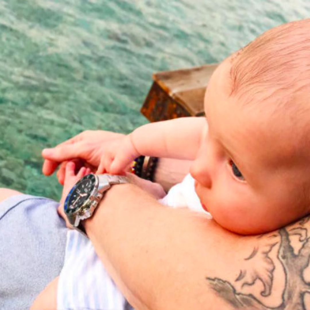 Ronan Keating's baby Cooper chills by the sea on holiday in Corfu
