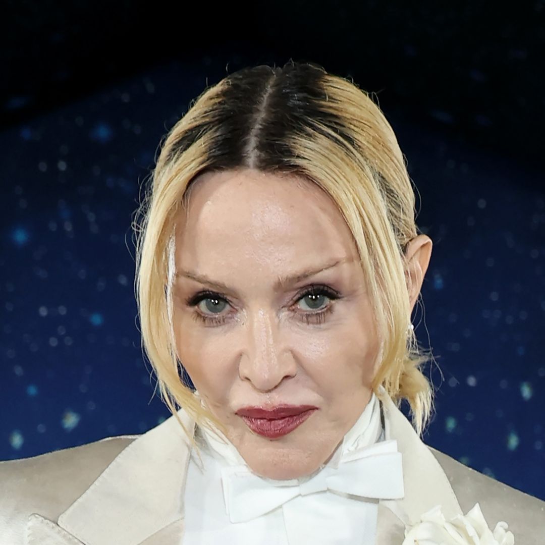 Madonna, 67, rocks sultry lingerie and a blindfold for rare Christmas photoshoot with boyfriend Akeem Morris, 29