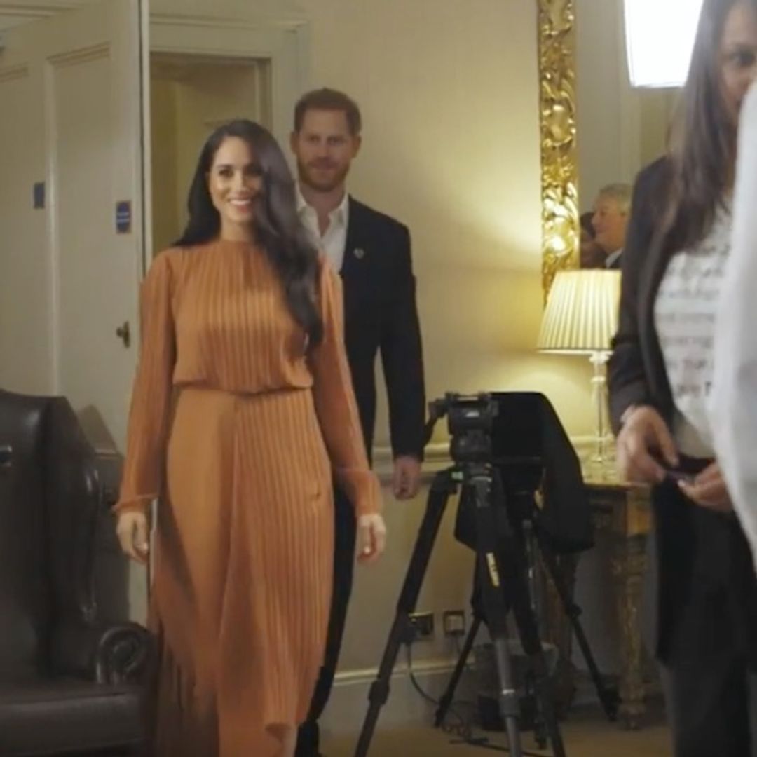Meghan Markle steps out for meeting with young leaders in new toffee coloured dress - and it's still in stock