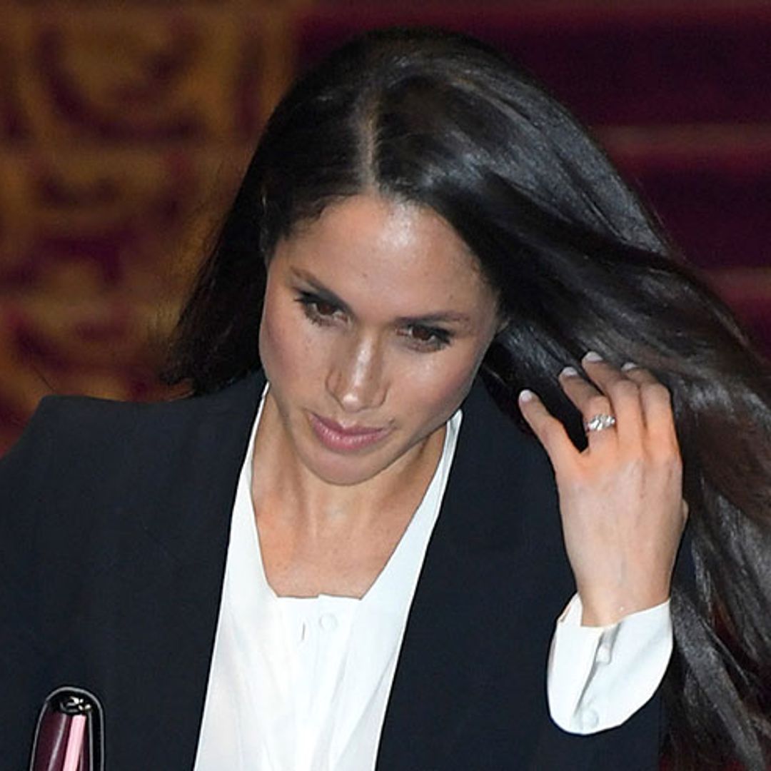 Find out why Meghan Markle wore a suit for her first public speaking engagement