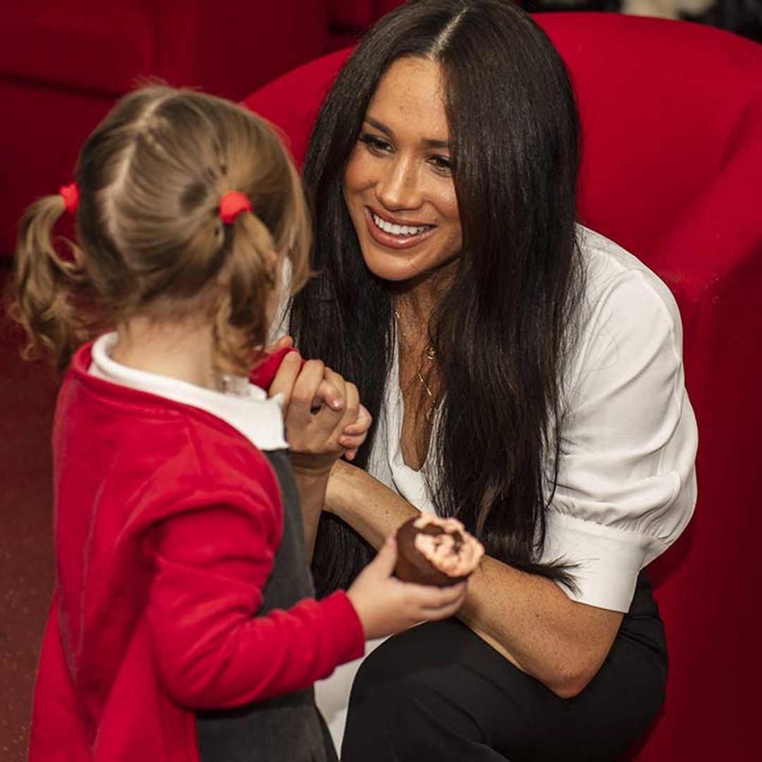 Duchess Meghan is chic in a khaki coat for surprise visit in Windsor with army families