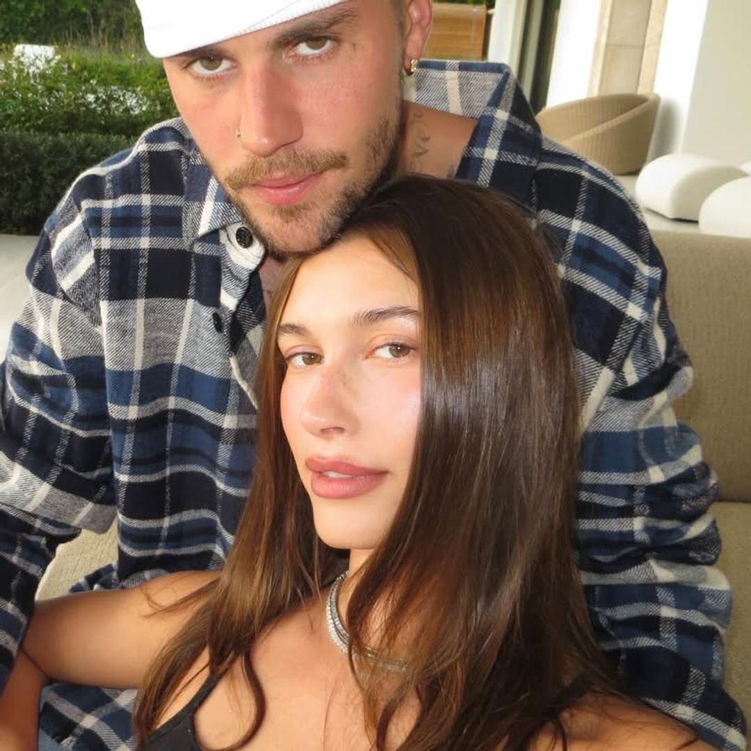 hailey and justin bieber sitting down together 