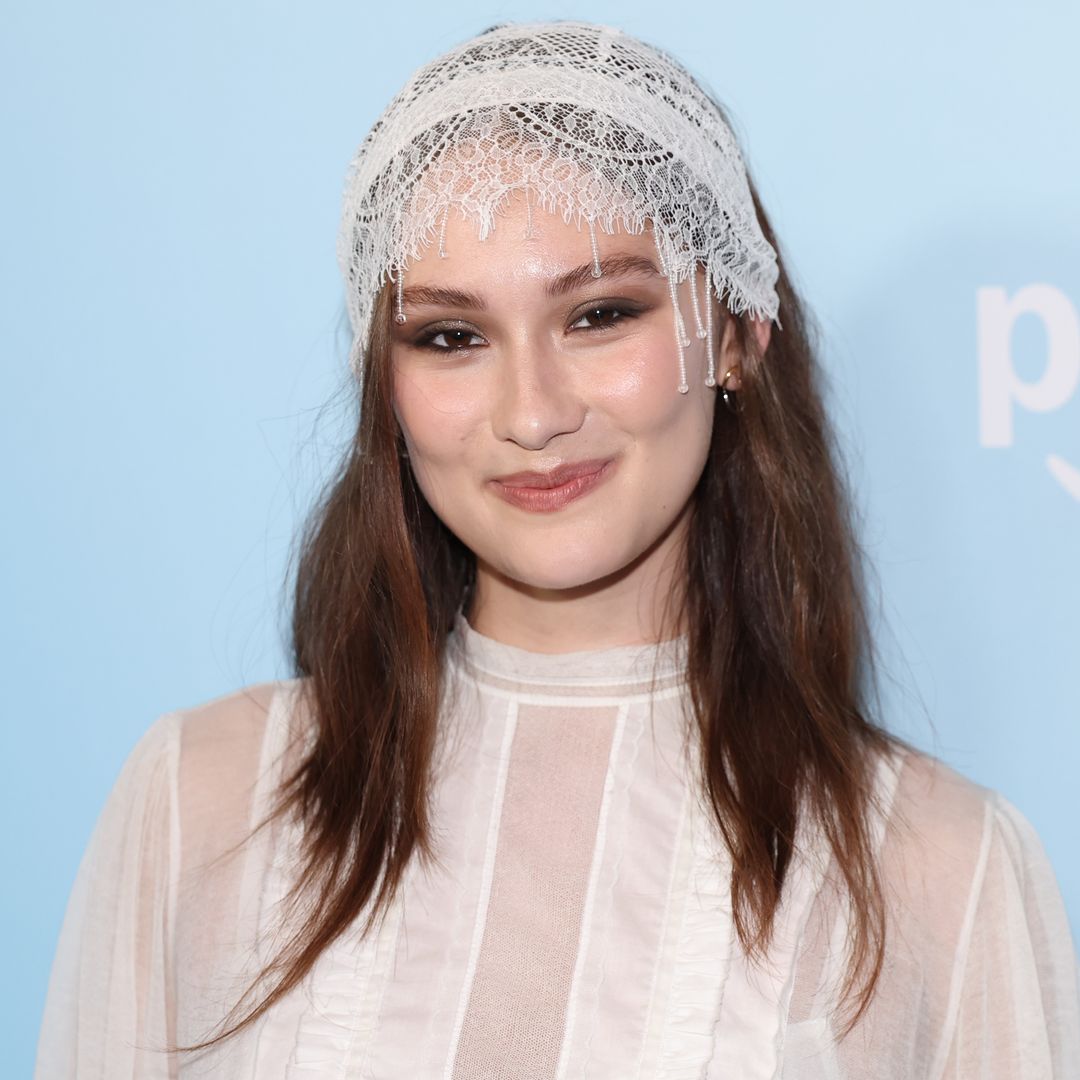 Lola Tung wore knee-high trainers and a sheer mini dress to The Summer I Turned Pretty premiere, and fashion lovers are obsessed