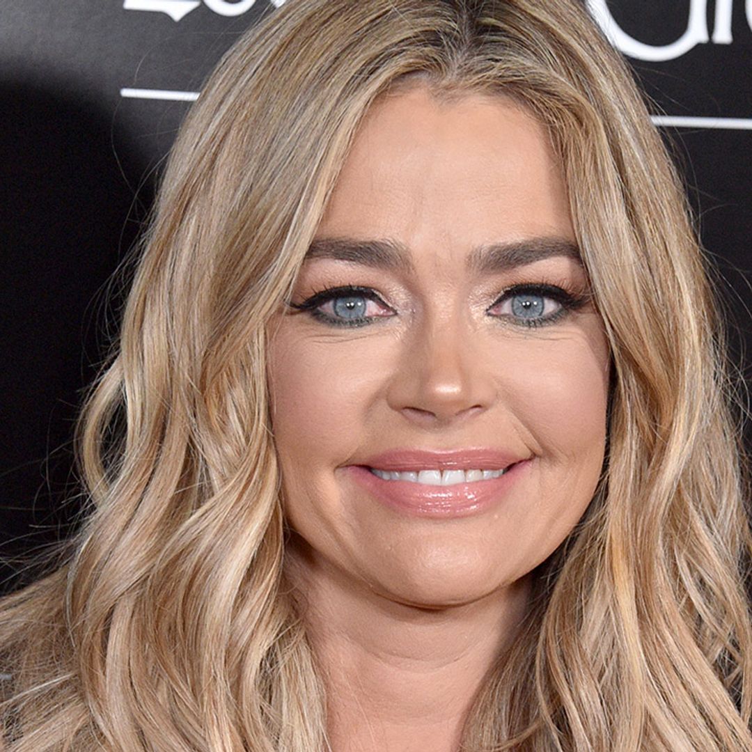 Denise Richards sizzles in leg-lengthening swimsuit in sun-drenched photo