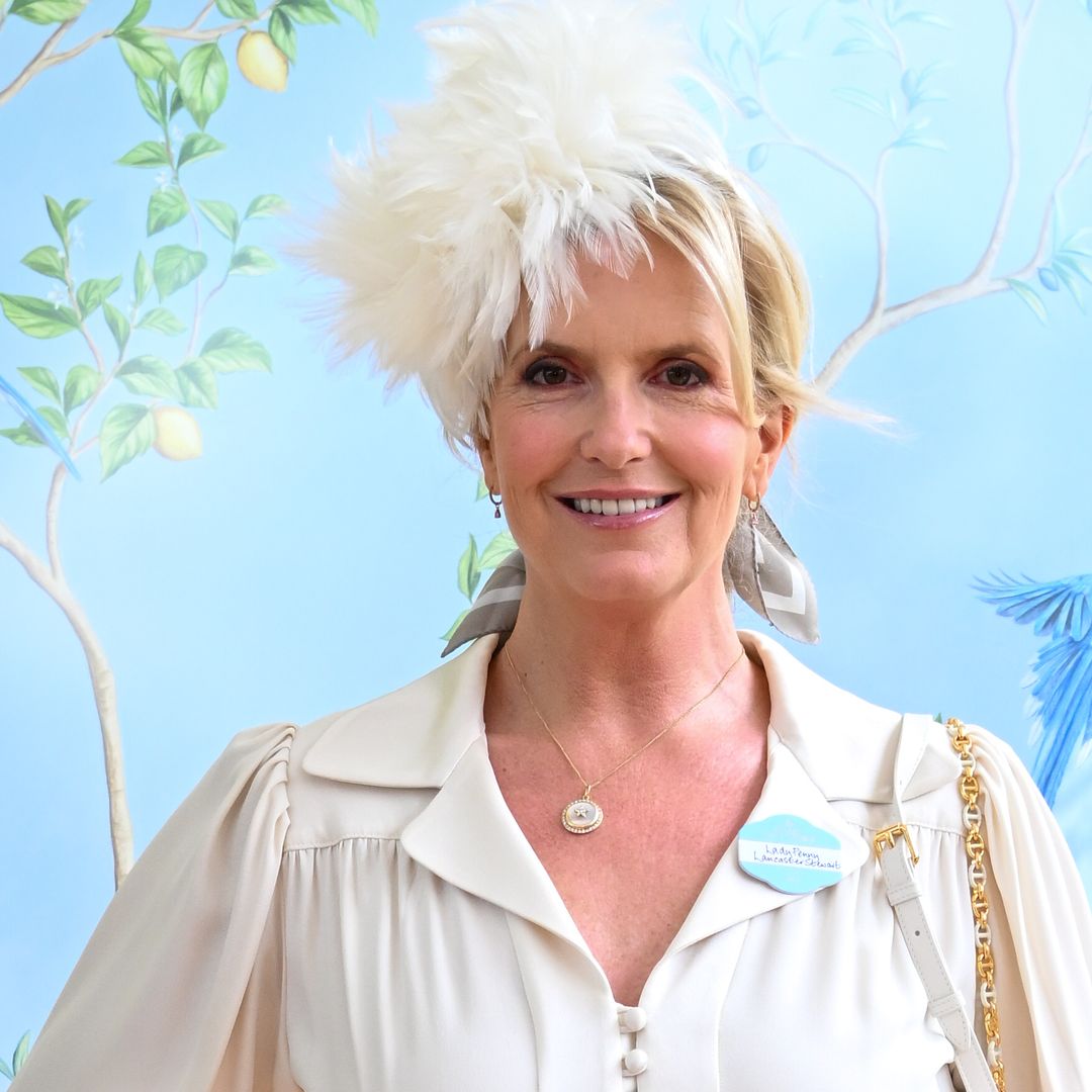 Penny Lancaster amazes in leg-lengthening mini dress and feathered fascinator