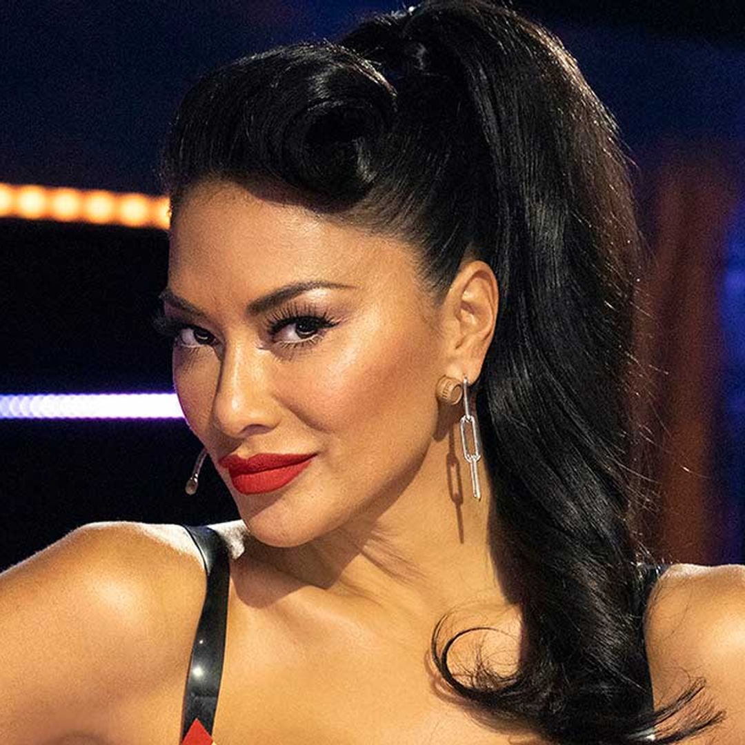 Nicole Scherzinger displays killer abs as she works out in nothing but a bikini