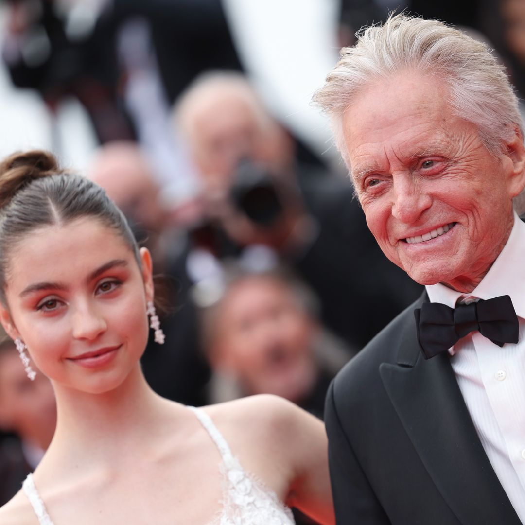 Michael Douglas' daughter Carys displays incredible curves in sultry wedding guest dress